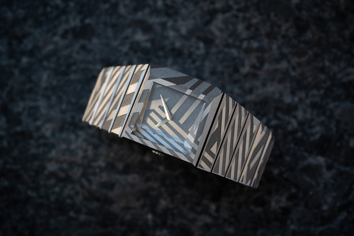 Another angle of the engraved B/1 Dazzle integrated titanium bracelet